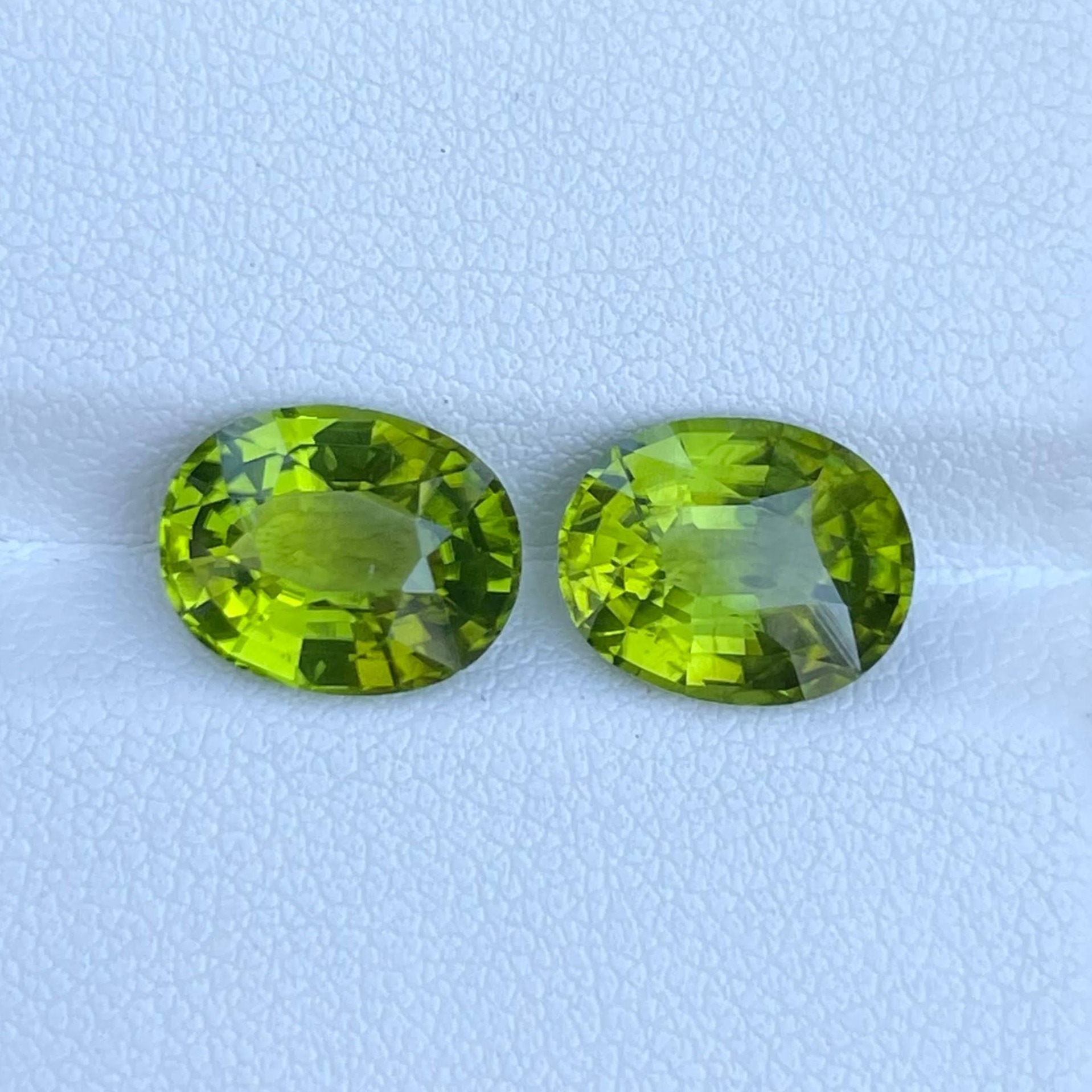 7.10 Carats Green Peridot Pair Fancy Oval Cut Natural Pakistani Gemstone — view 1