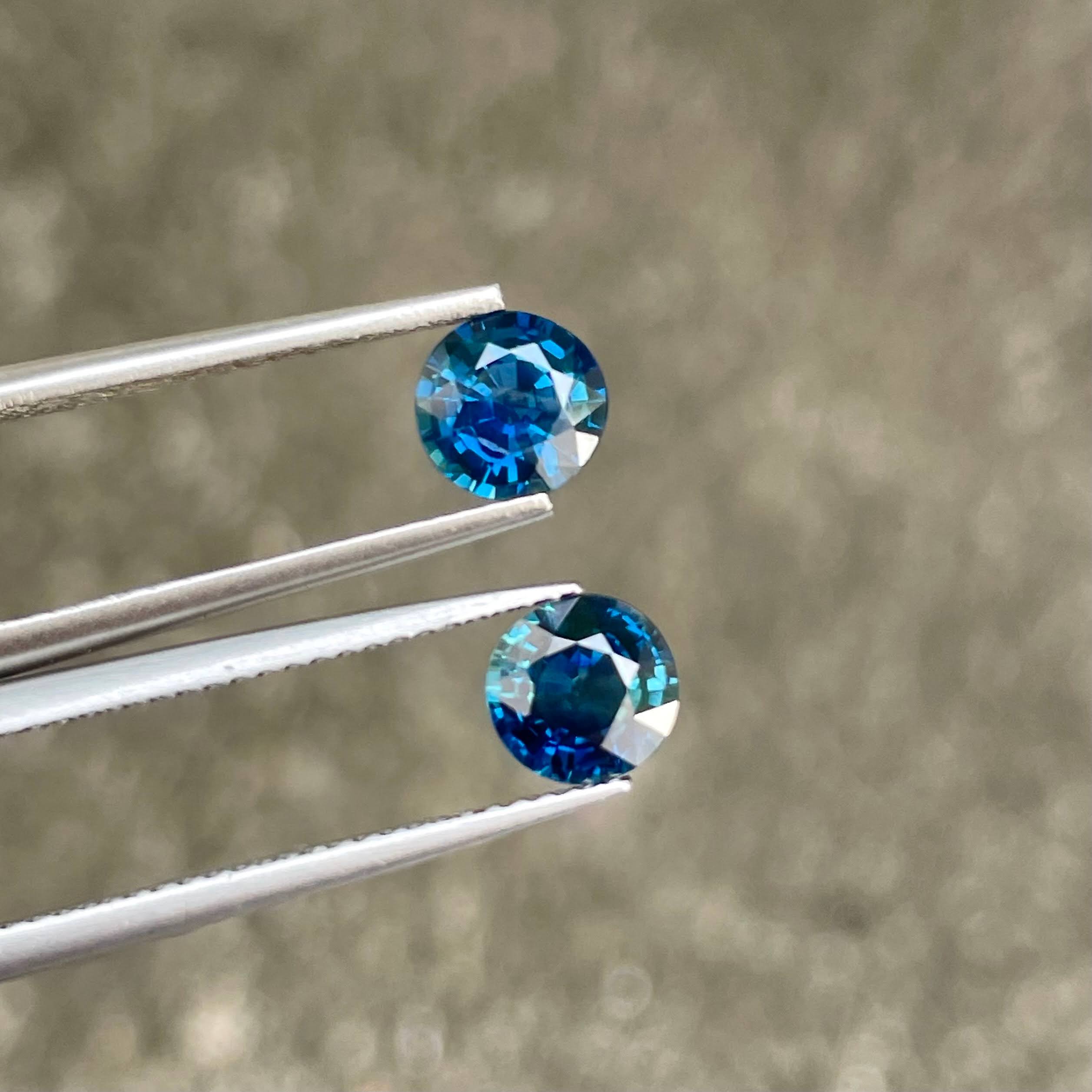 2.24 Carats Teal Blue Sapphire Pair Round Cut Natural Madagascar's Gemstone — view 1