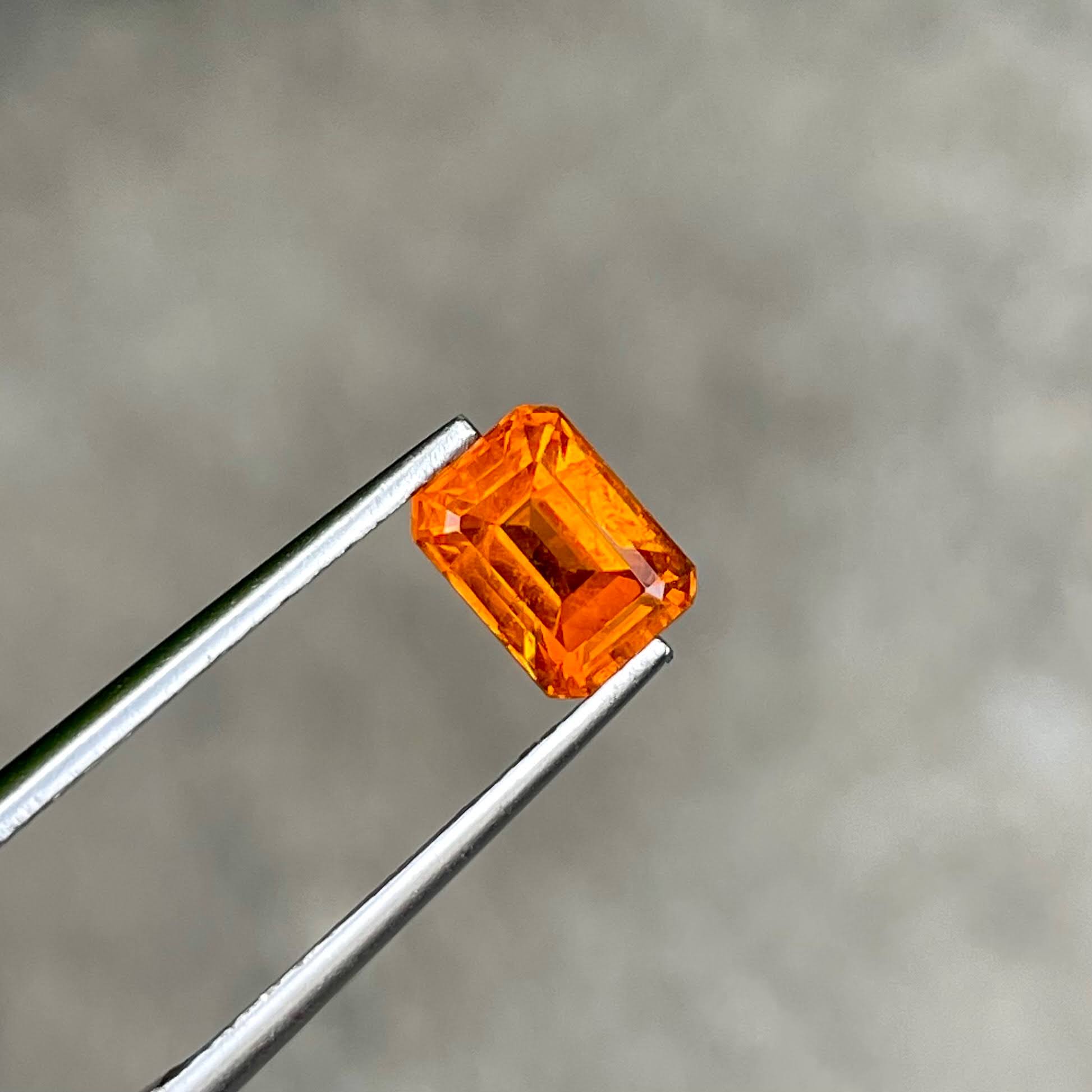 1.67 Carats Fanta Spessartite Garnet Stone Emerald Cut Nigerian Gemstone — view 1